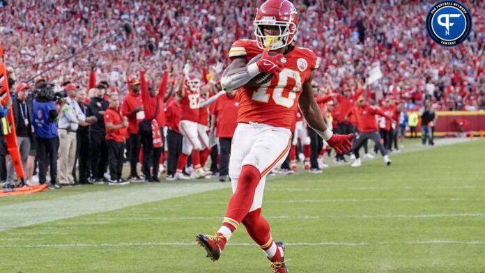 Isiah Pacheco (10) scores a touchdown against the Los Angeles Chargers during the second half at GEHA Field at Arrowhead Stadium.