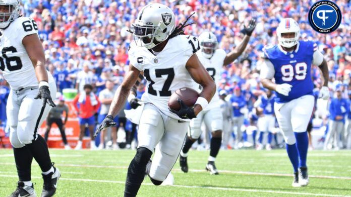 Davante Adams (17) runs for the end zone to score a touchdown in the first quarter against the Buffalo Bills at Highmark Stadium.