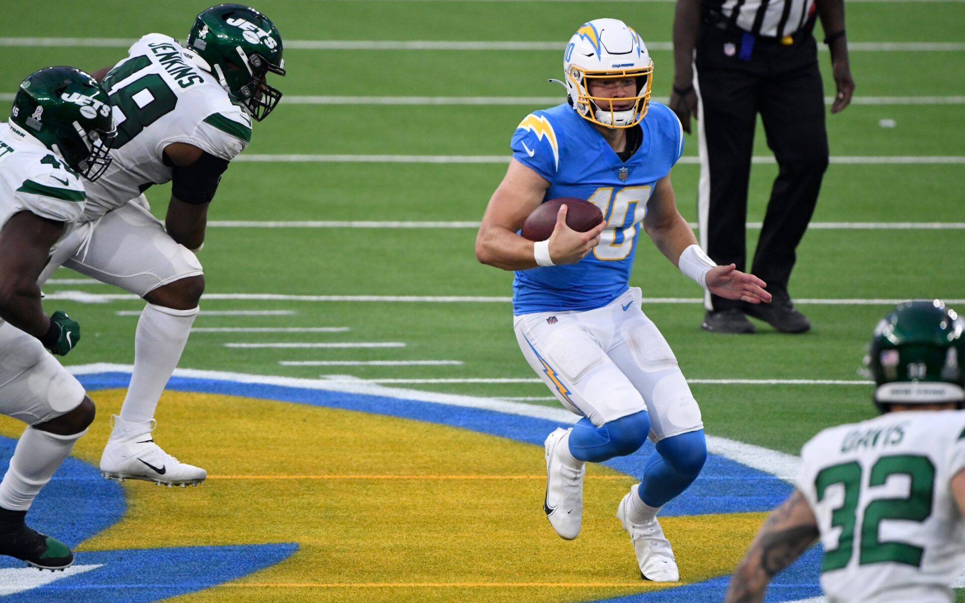 Los Angeles Chargers QB Justin Herbert (10) runs with the ball against the New York Jets.