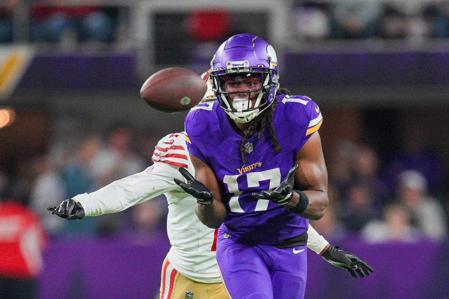 Minnesota Vikings wide receiver K.J. Osborn (17) catches a pass against the San Francisco 49ers in the fourth quarter at U.S. Bank Stadium.