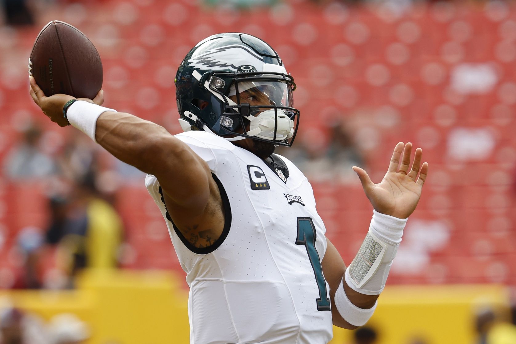 Philadelphia Eagles quarterback Jalen Hurts (1) passes the ball during warmup prior to the game Washington Commanders at FedExField.