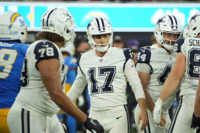 Dallas Cowboys K Brandon Aubrey (17) celebrates with teammates after making a field goal.