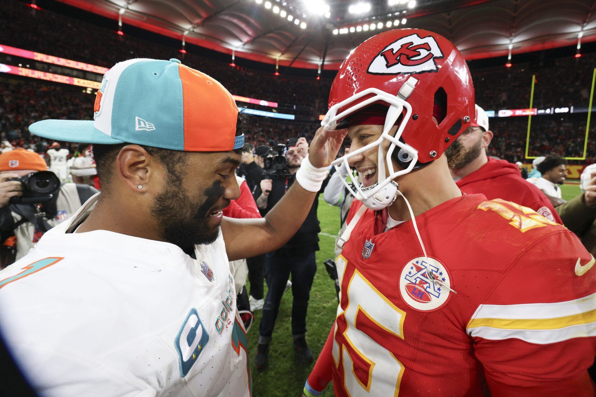 Kansas City Chiefs quarterback Patrick Mahomes (15) greets Miami Dolphins quarterback Tua Tagovailoa (1) after an NFL International Series game at Deutsche Bank Park.