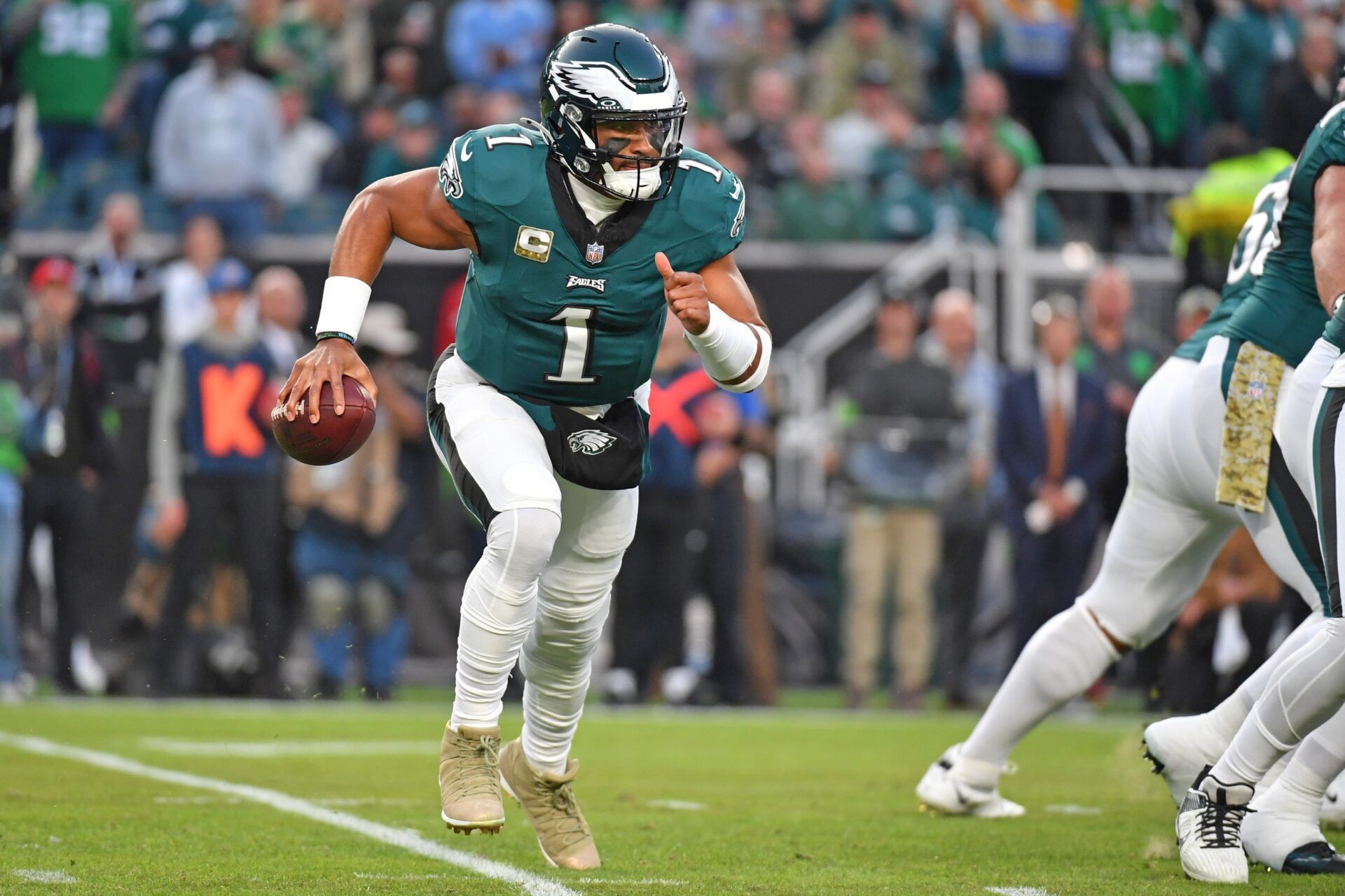 Jalen Hurts (1) runs with the ball against the Dallas Cowboys during the first quarter at Lincoln Financial Field.