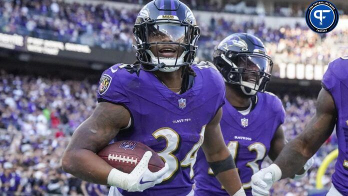 Keaton Mitchell (34) celebrates his touchdown against the Seattle Seahawks during the third quarter at M&T Bank Stadium.