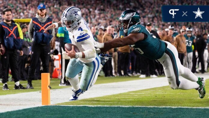 Philadelphia Eagles defensive end Brandon Graham (55) pushes Dallas Cowboys quarterback Dak Prescott (4) out of bounds short of a two point conversion during the fourth quarter at Lincoln Financial Field.