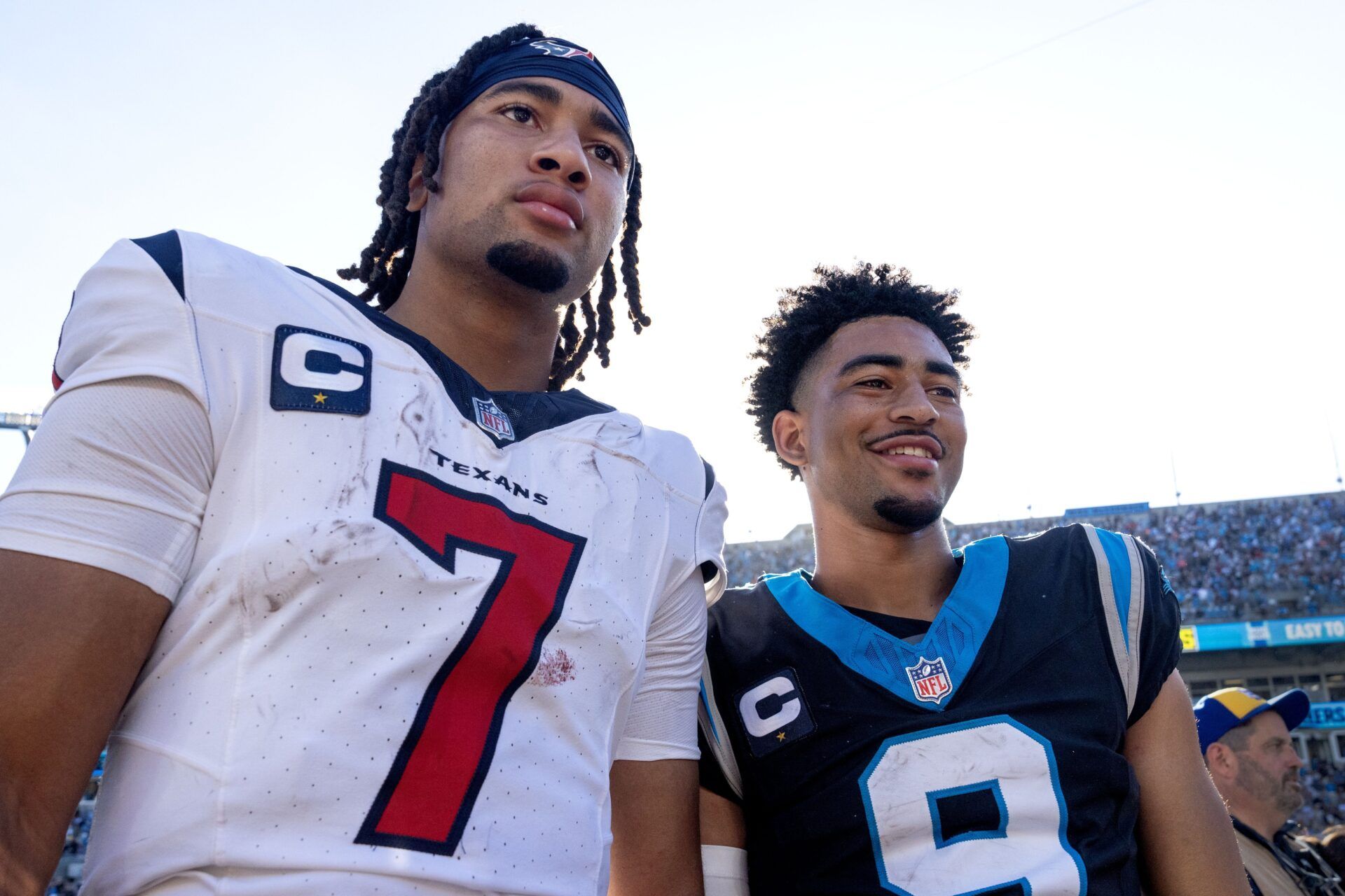 Houston Texans quarterback C.J. Stroud (7) and Carolina Panthers quarterback Bryce Young (9) after the game at Bank of America Stadium.