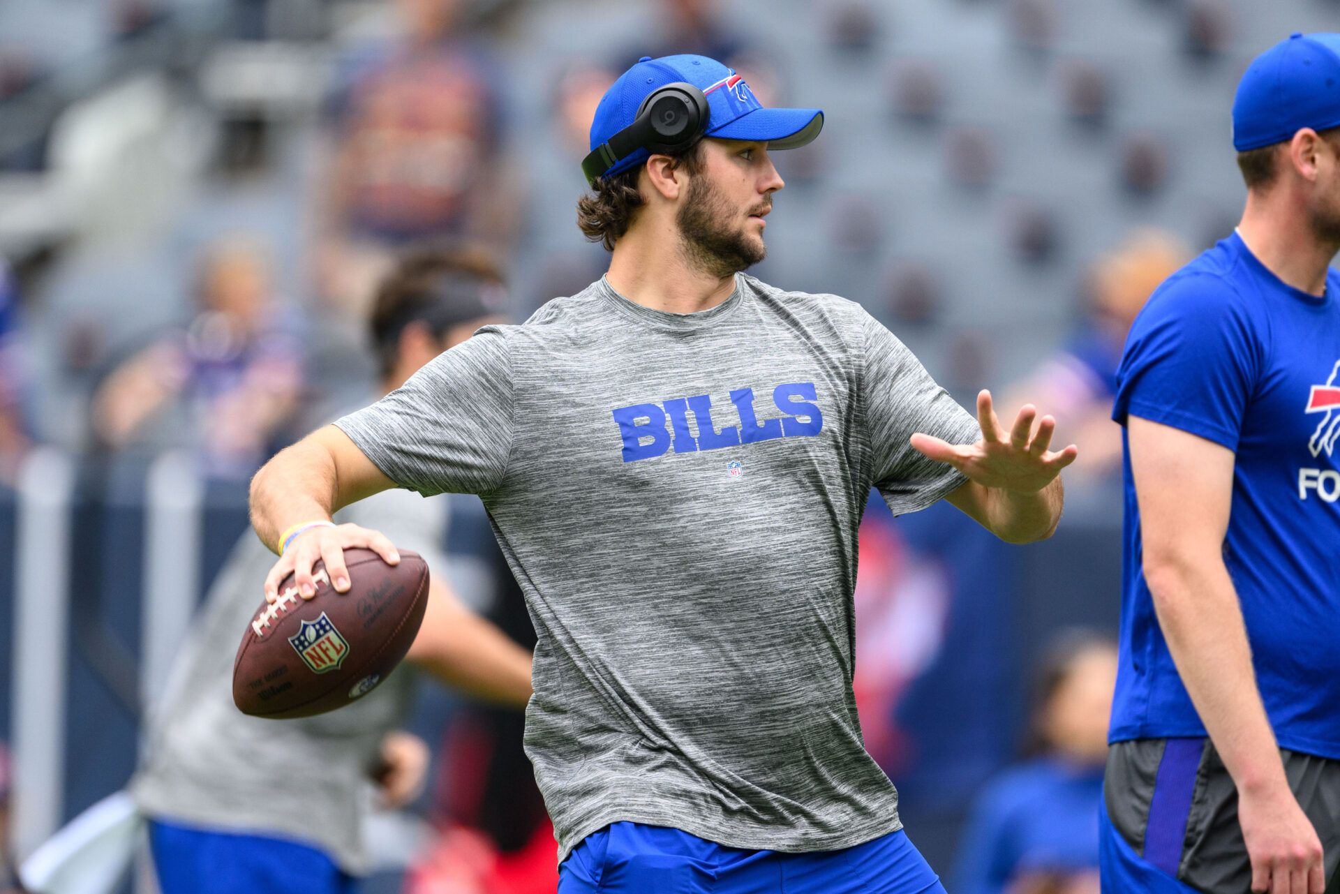 Buffalo Bills quarterback Josh Allen (17) warms up before a game against the Chicago Bears at Soldier Field.