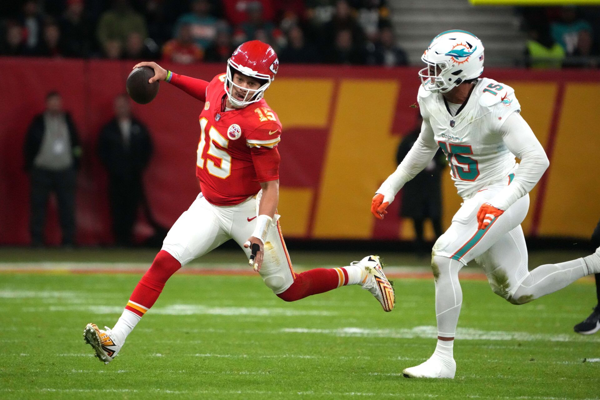 Kansas City Chiefs QB Patrick Mahomes (15) runs the ball against the Miami Dolphins.