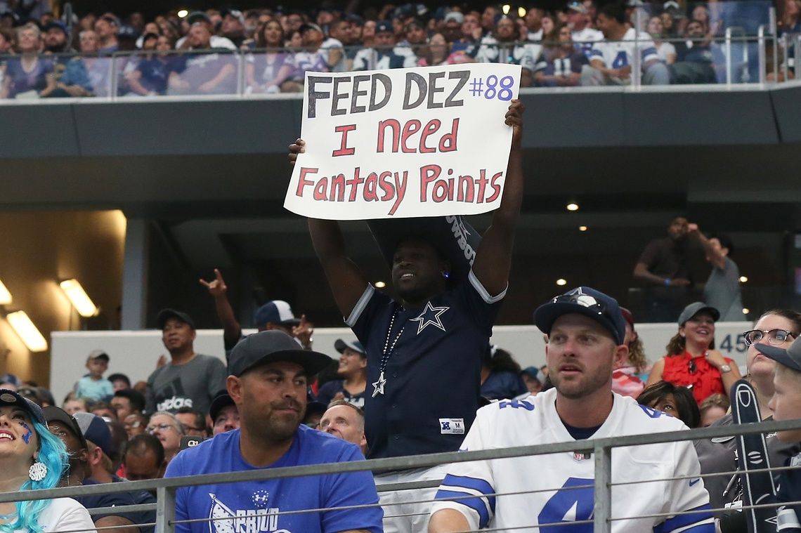 Dallas Cowboys fan holds up a sign for receiver Dez Bryant (not pictured) wanting fantasy points against the Los Angeles Rams at AT&T Stadium.