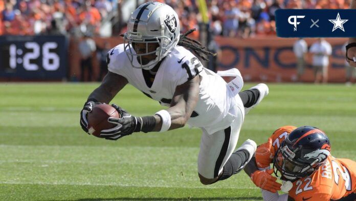 Martavis Bryant (12) is defended by Denver Broncos defensive back Tramaine Brock (22) in the second quarter at Broncos Stadium at Mile High.