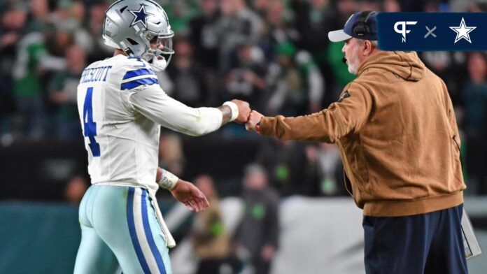 Dallas Cowboys quarterback Dak Prescott (4) and head coach Mike McCarthy fist pump during the game against the Philadelphia Eagles.