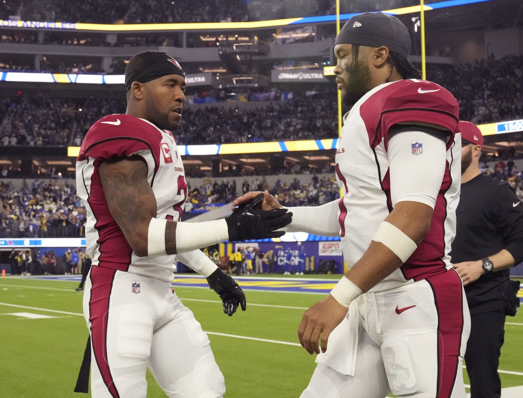 Arizona Cardinals safety Budda Baker (3) shakes hands with quarterback Kyler Murray (1) before playing against the Los Angeles Rams.