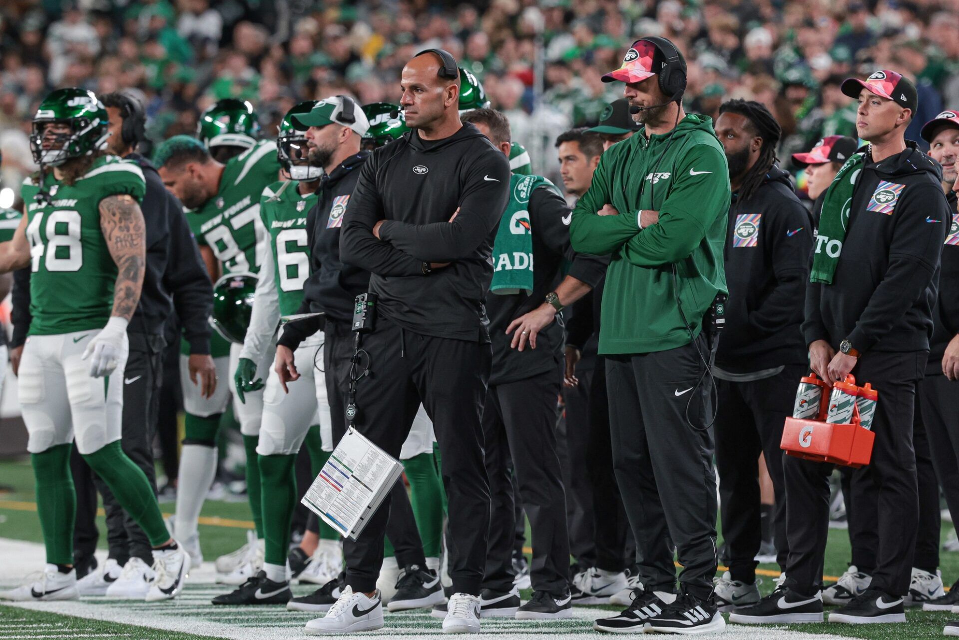 New York Jets head coach Robert Saleh (left) an dquarterback Aaron Rodgers (right) looks on during the second half against the Philadelphia Eagles at MetLife Stadium.