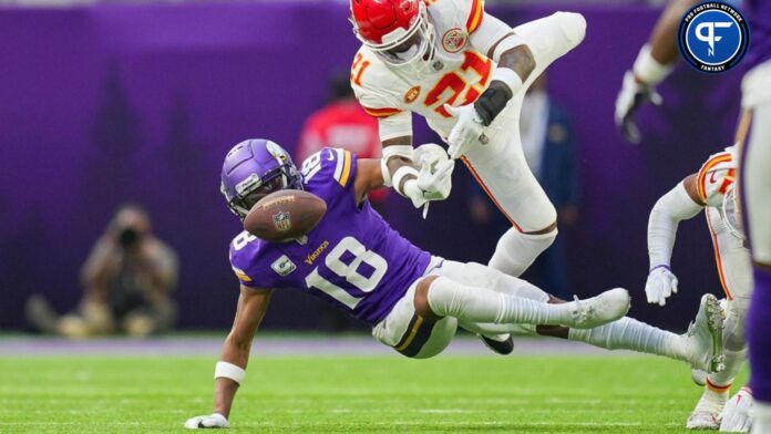 Kansas City Chiefs safety Mike Edwards (21) breaks up a pass to Minnesota Vikings wide receiver Justin Jefferson (18) in the third quarter.