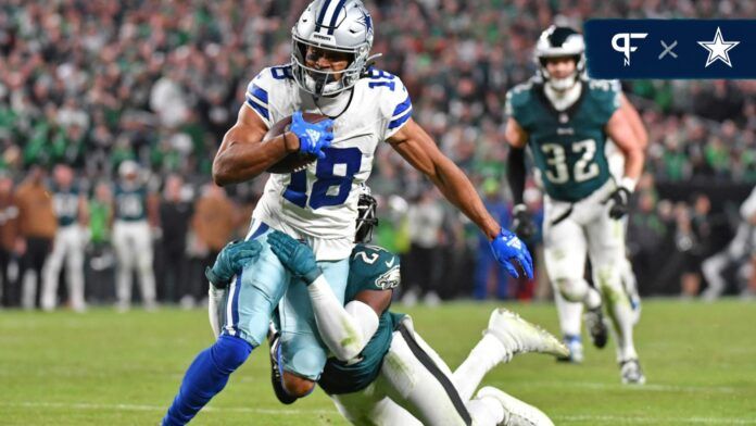 Philadelphia Eagles cornerback James Bradberry (24) tackles Dallas Cowboys wide receiver Jalen Tolbert (18) during the fourth quarter at Lincoln Financial Field.