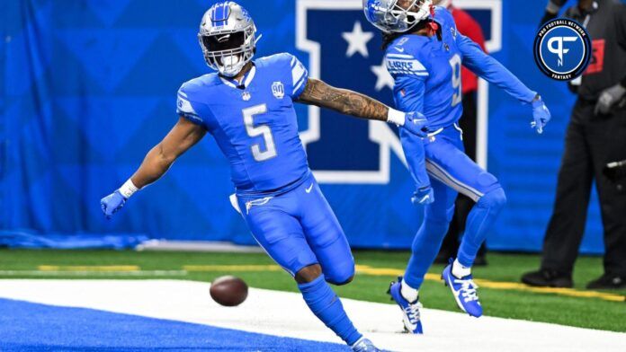 Detroit Lions RB David Montgomery (5) celebrates after a touchdown.