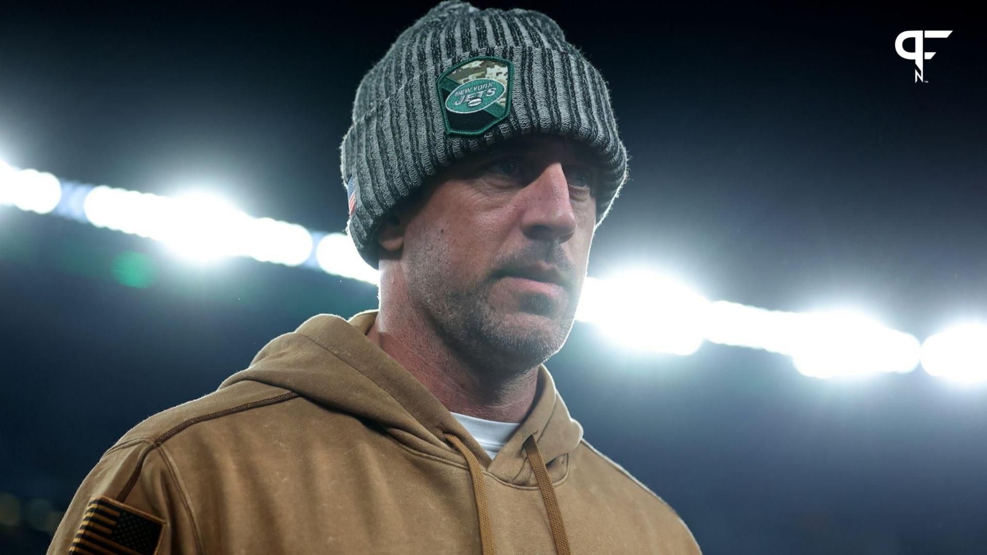 New York Jets injured quarterback Aaron Rodgers leaves the field after losing to the Los Angeles Chargers at MetLife Stadium.