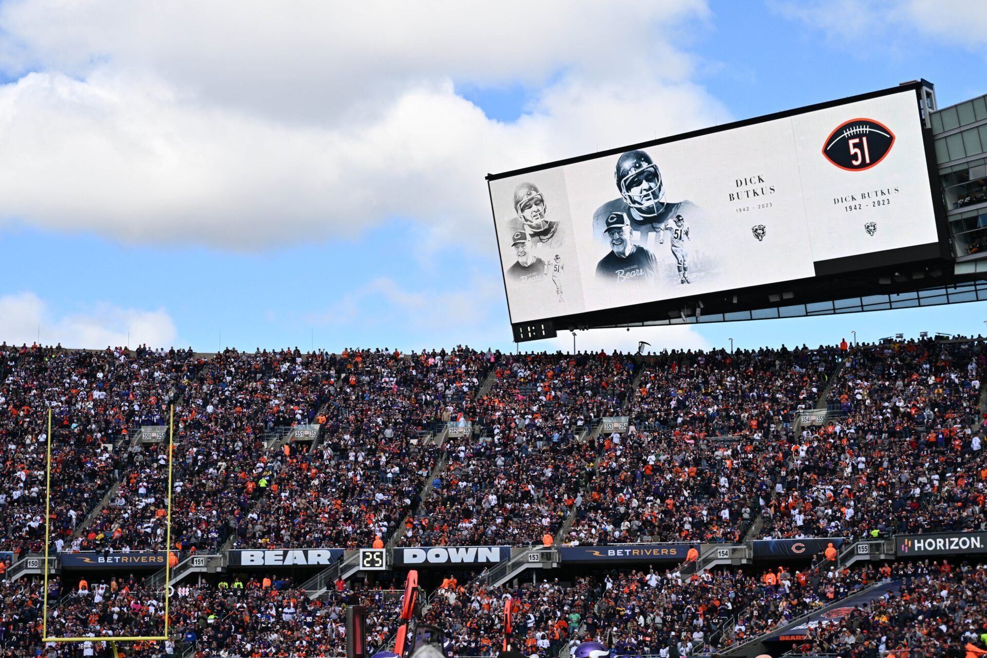 Former Chicago Bear and Hall of Famer Dick Butkus is honored during a timeout in the first half of a game between the Minnesota Vikings and the Chicago Bears at Soldier Field.