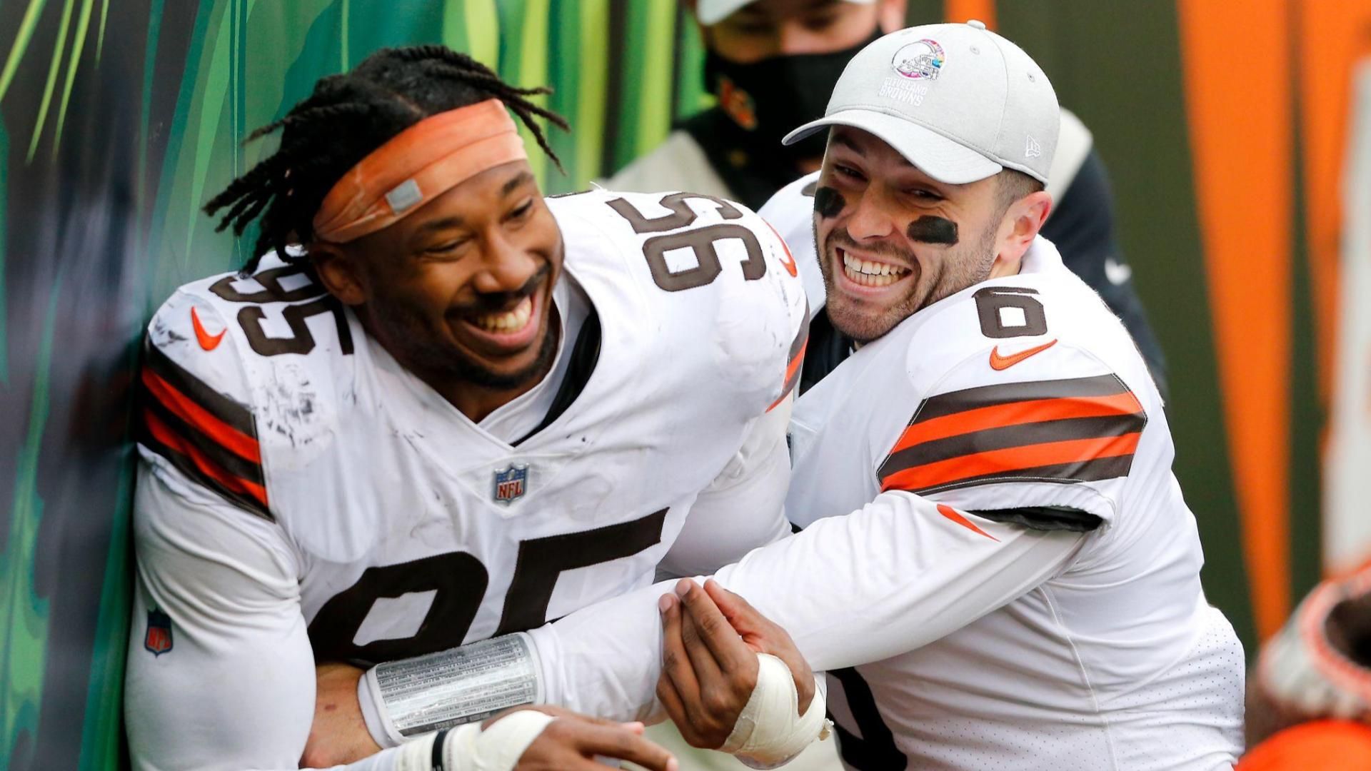 Cleveland Browns defensive end Myles Garrett (95) and quarterback Baker Mayfield (6) celebrate the come from behind victory in the waning seconds against the Cincinnati Bengals at Paul Brown Stadium.