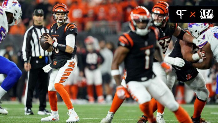 Cincinnati Bengals QB Joe Burrow (9) looks to throw to WR Ja'Marr Chase (1) against the Buffalo Bills.