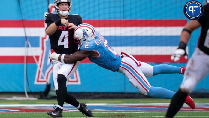 Tennessee Titans linebacker Azeez Al-Shaair (2) pressures Atlanta Falcons quarterback Taylor Heinicke (4).