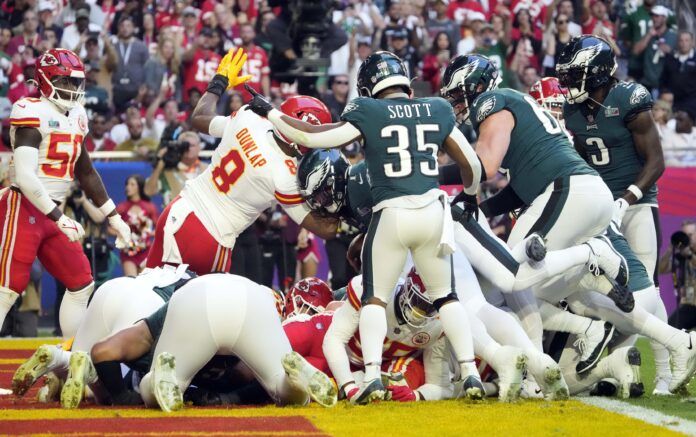 Philadelphia Eagles QB Jalen Hurts (1) scores a touchdown on a QB sneak against the Kansas City Chiefs in the Super Bowl.