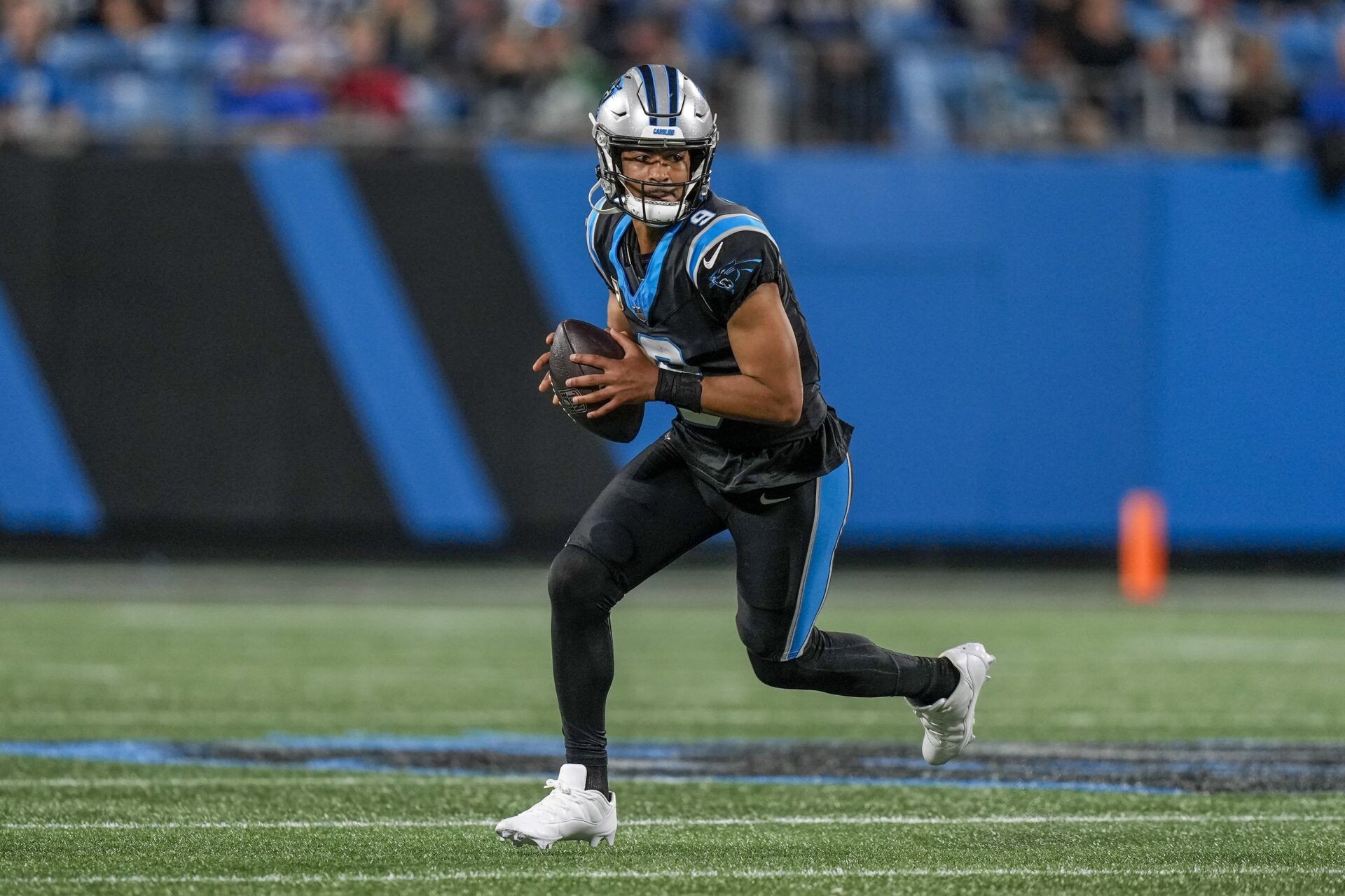 Bryce Young (9) looks to pass during the second half against the Indianapolis Colts at Bank of America Stadium.