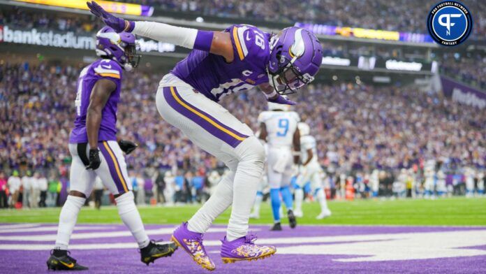 Justin Jefferson (18) celebrates his touchdown against the Los Angeles Chargers in the fourth quarter at U.S. Bank Stadium.