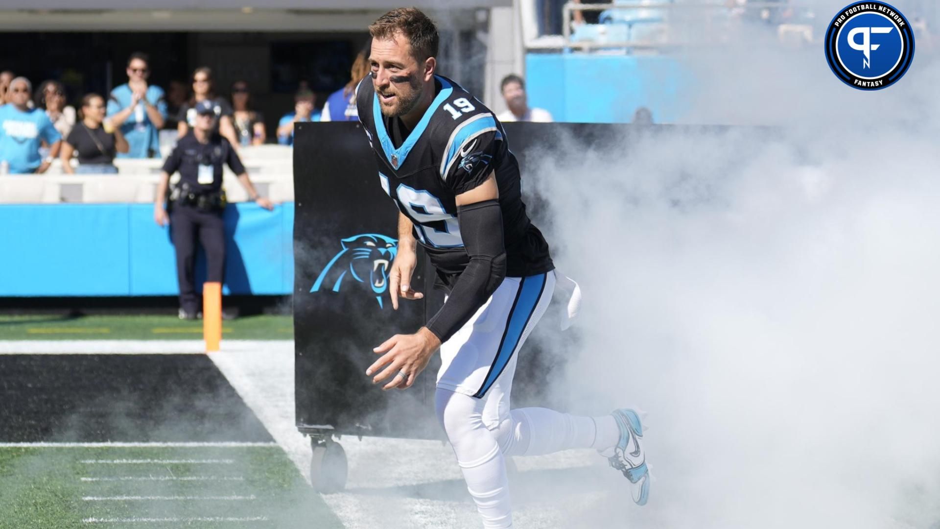 Adam Thielen (19) runs out of the tunnel onto the field at the start of the first quarter against the Houston Texans at Bank of America Stadium.