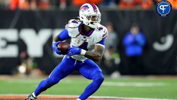 James Cook (4) catches a pass out of the backfield in the third quarter against the Buffalo Bills at Paycor Stadium.