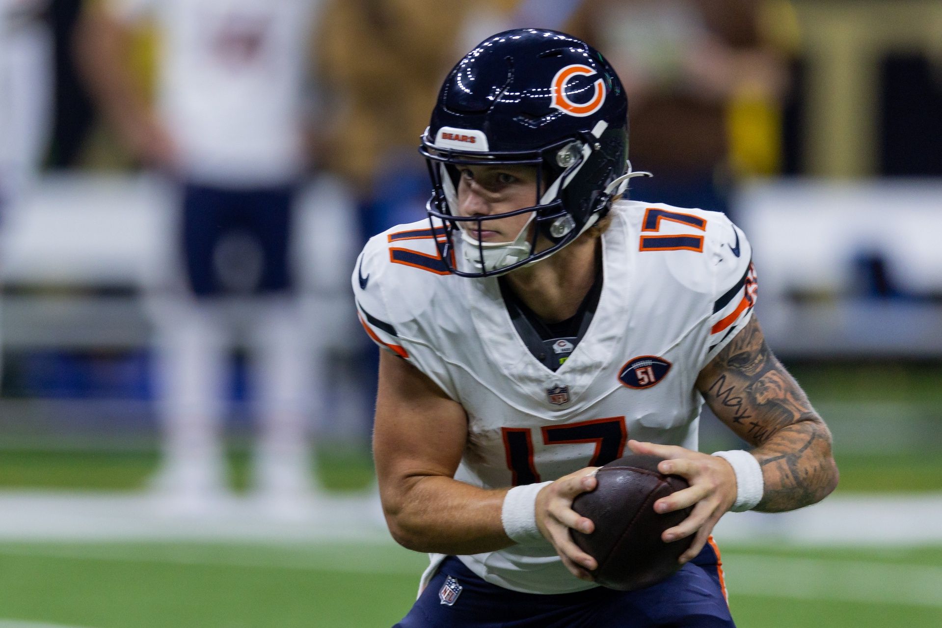 Chicago Bears quarterback Tyson Bagent (17) is rushed out of the pocket by the New Orleans Saints during the first half at the Caesars Superdome.