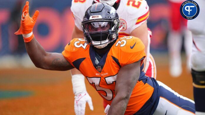 Denver Broncos running back Javonte Williams (33) reacts following his touchdown in the first quarter against the Kansas City Chiefs at Empower Field at Mile High.