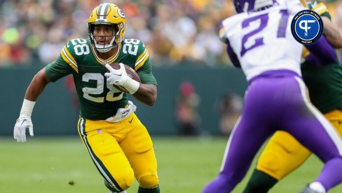 Green Bay Packers running back AJ Dillon (28) runs the ball against the Minnesota Vikings on Sunday, October 29, 2023, at Lambeau Field in Green Bay, Wis. The Vikings won the game, 24-10.