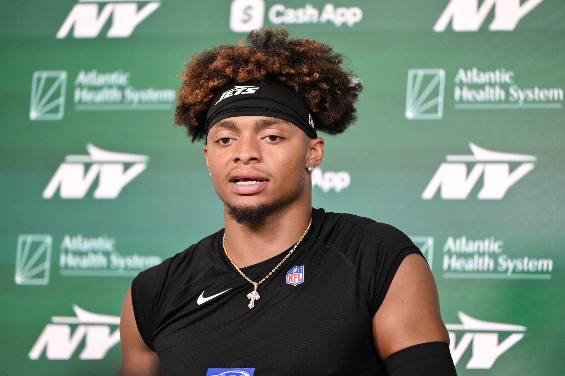 New York Jets quarterback Justin Fields (7) speaks at a press conference during minicamp at Atlantic Health Jets Training Center.