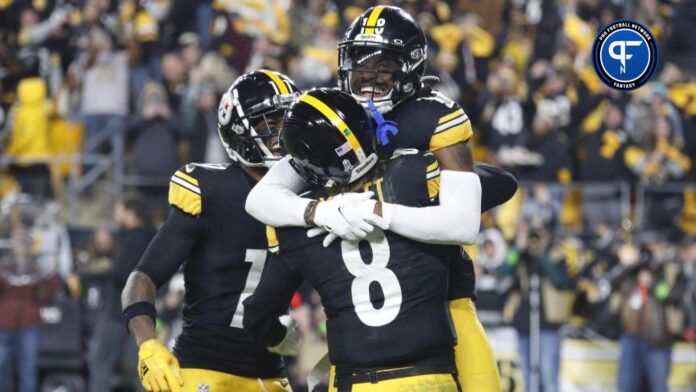 Pittsburgh Steelers quarterback Kenny Pickett (8) and wide receiver Diontae Johnson (18) celebrate after combining for the game winning touchdown against the Tennessee Titans.