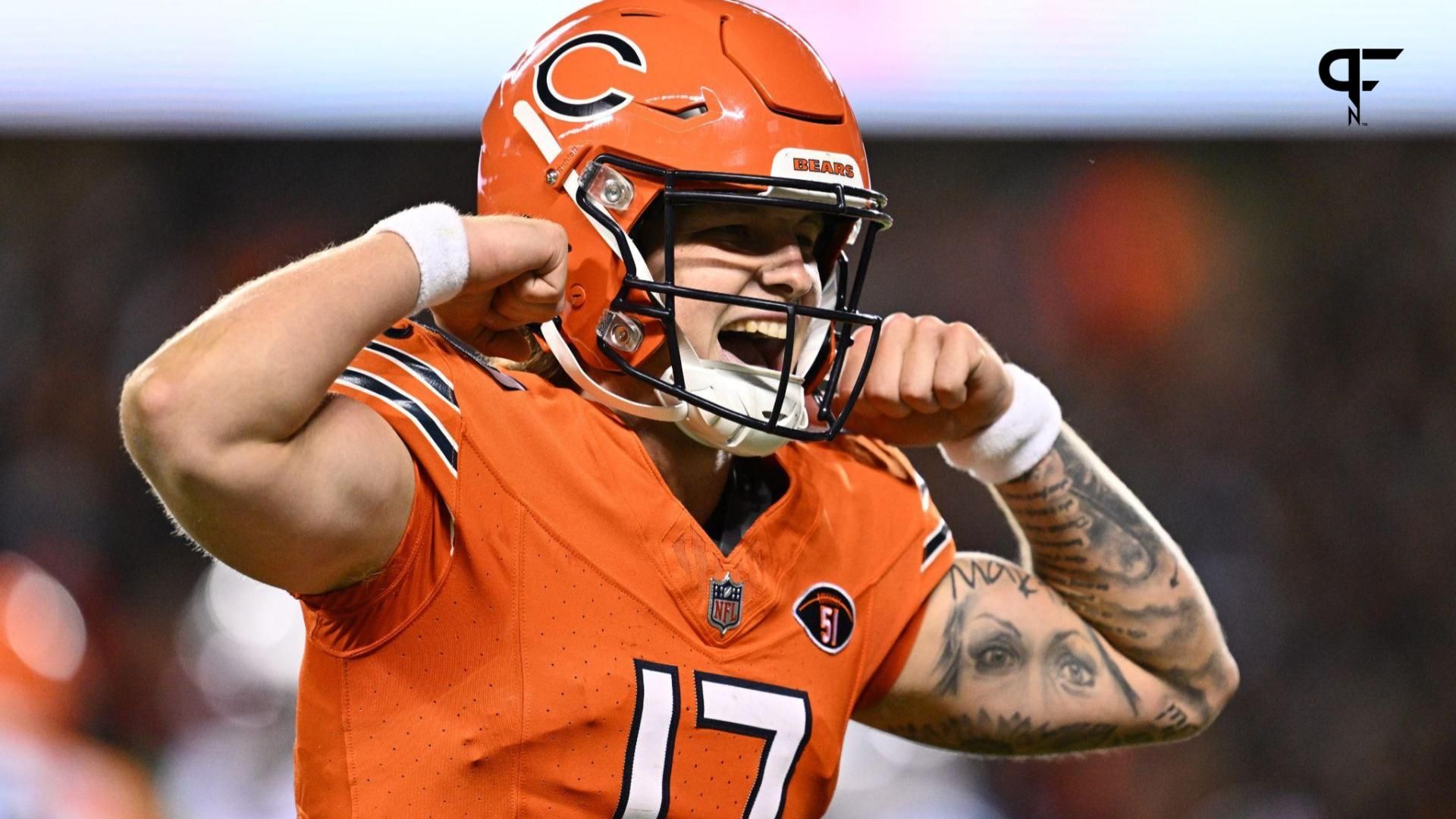 Chicago Bears QB Tyson Bagent (17) celebrates after scoring a touchdown against the Carolina Panthers.