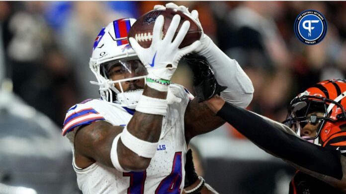 Buffalo Bills wide receiver Stefon Diggs (14) catches a two-point conversion as Cincinnati Bengals safety Dax Hill (23) defends in the fourth quarter during a Week 9 NFL football game between the Buffalo Bills and the Cincinnati Bengals