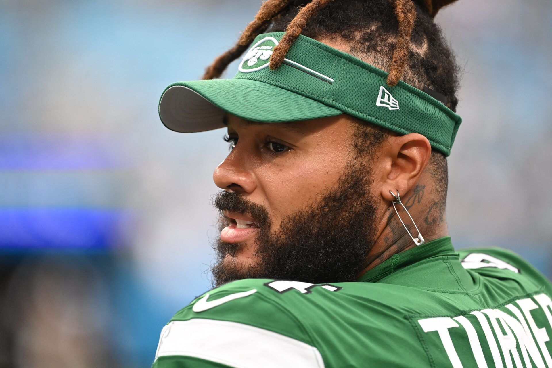 New York Jets offensive tackle Billy Turner (54) on the sidelines in the fourth quarter at Bank of America Stadium.