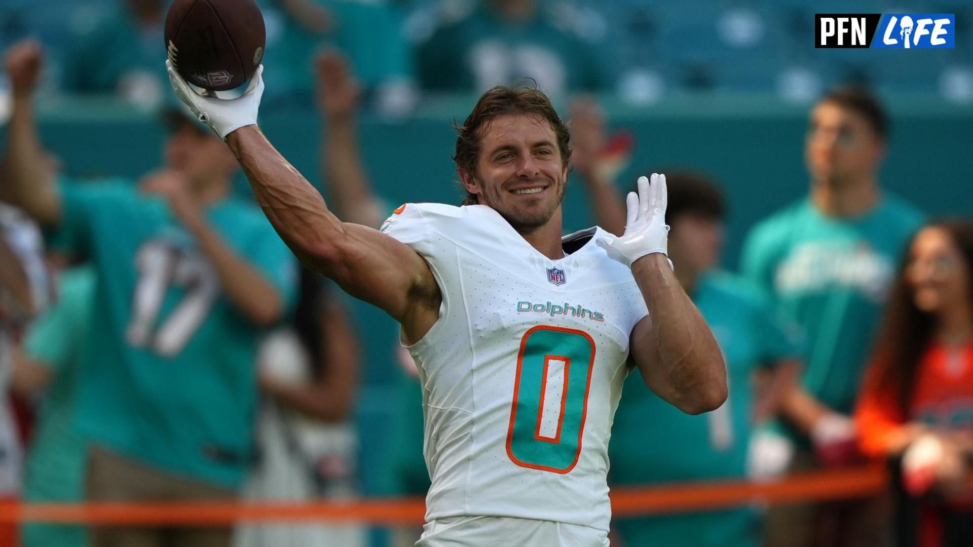 Braxton Berrios (0) warms up prior to the game against the Carolina Panthers at Hard Rock Stadium.