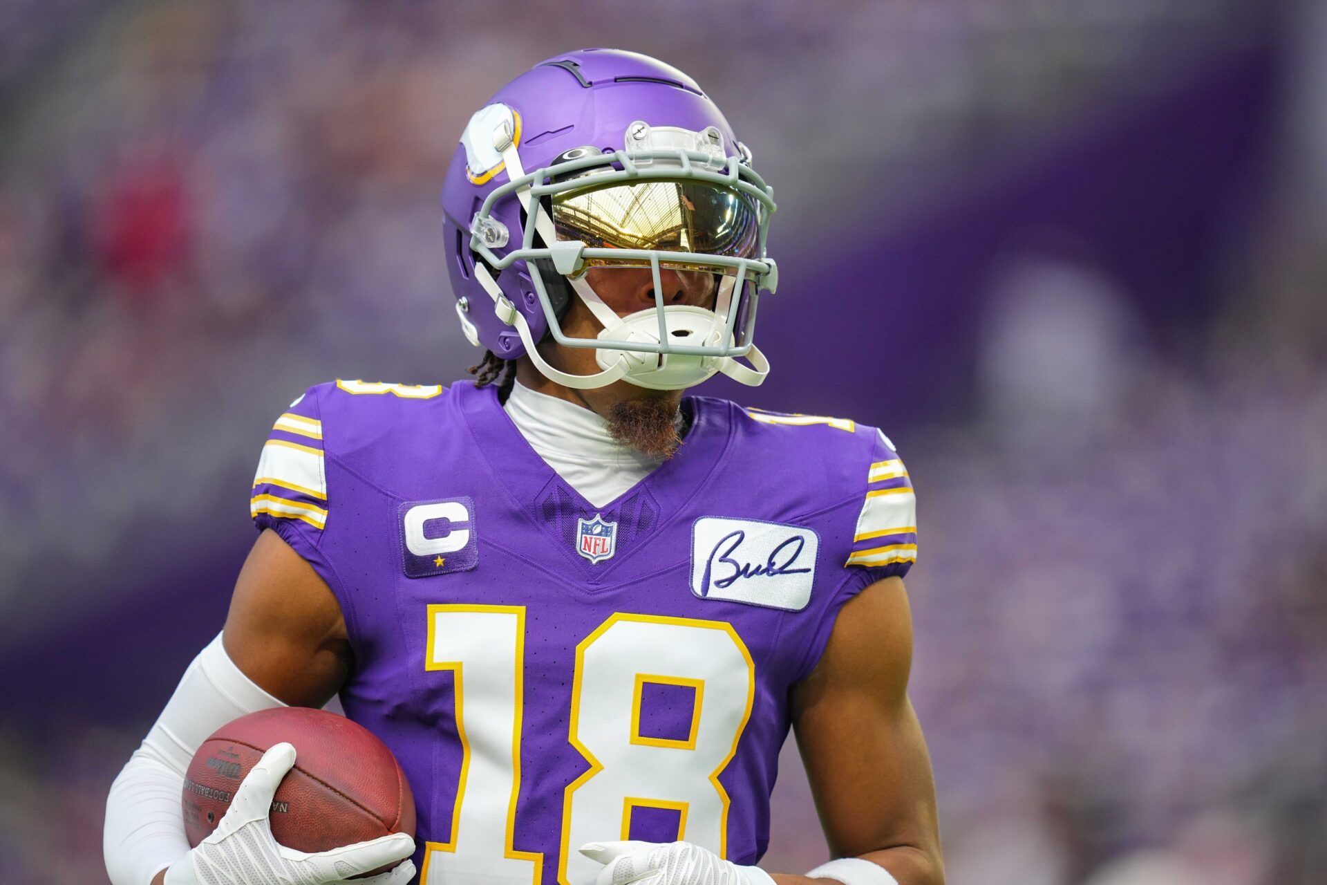 Minnesota Vikings wide receiver Justin Jefferson (18) warms up before the game against the Tampa Bay Buccaneers at U.S. Bank Stadium.