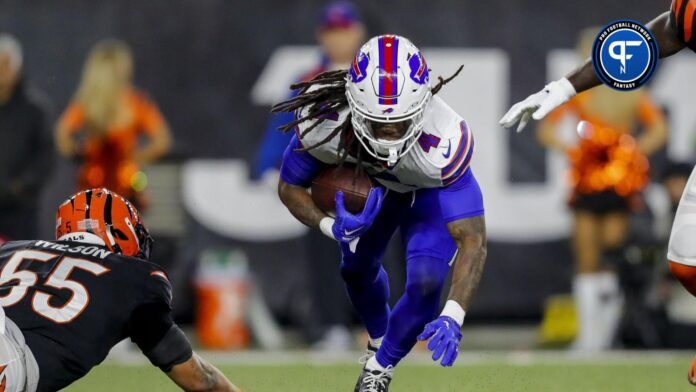 Buffalo Bills running back James Cook (4) runs with the ball against the Cincinnati Bengals in the second half at Paycor Stadium.