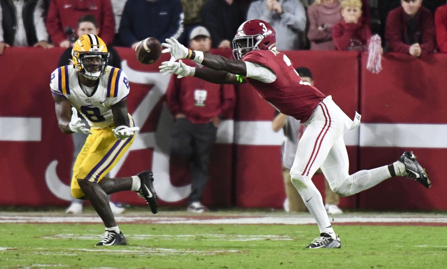 Alabama Crimson Tide defensive back Terrion Arnold (3) breaks up a pass intended for LSU Tigers wide receiver Malik Nabers (8) at Bryant-Denny Stadium.