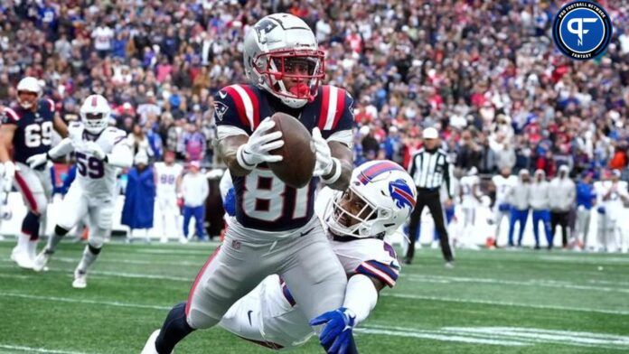 Demario Douglas pulls in a pass against Bills cornerback Christian Benford that put New England just short of a goal.