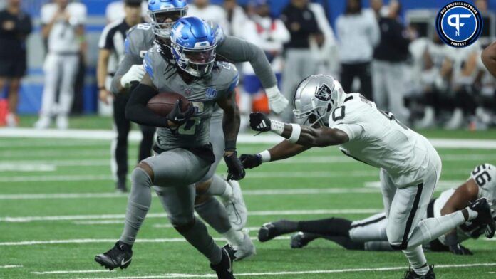 Jahmyr Gibbs breaks away from Las Vegas Raiders cornerback Jakorian Bennett and runs for a 27-yard touchdown during the third quarter at Ford Field.