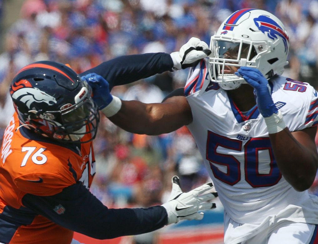 Bills edge Greg Rousseau (50), right, pushes aside Denver tackle Calvin Anderson (76) in the first half during the Bills preseason game against Denver Saturday, Aug. 20, 2022 at Highmark Stadium.