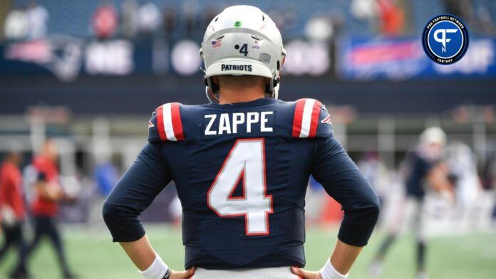 New England Patriots quarterback Bailey Zappe (4) during warm ups before a game against the Buffalo Bills at Gillette Stadium.