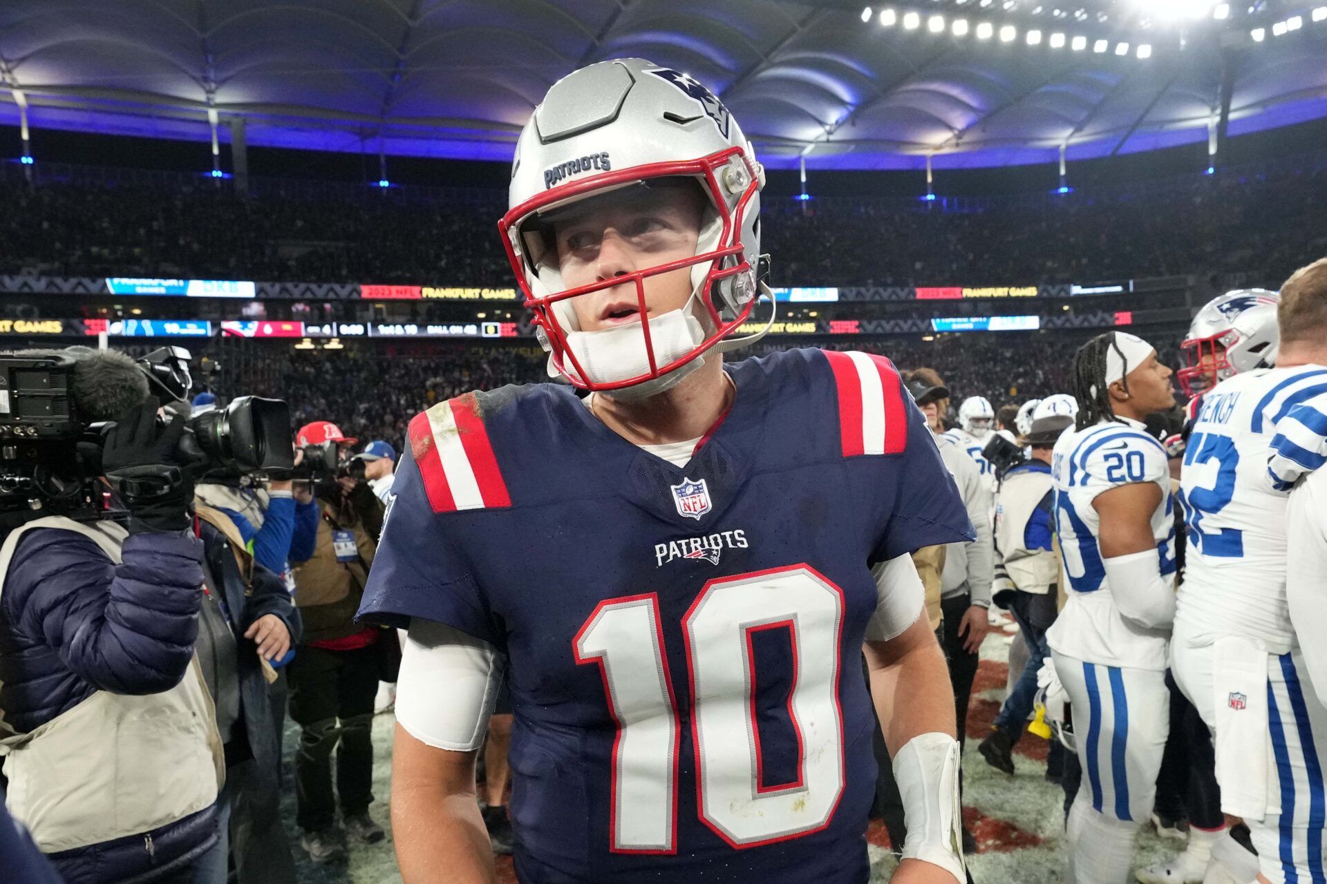 New England Patriots QB Mac Jones (10) walks off the field after the game against the Indianapolis Colts.