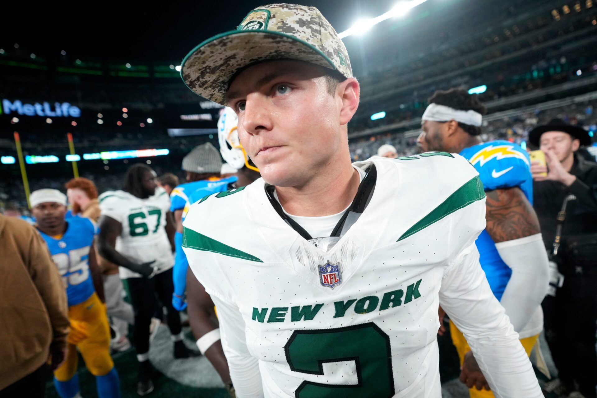 New York Jets QB Zach Wilson (2) walks off the field after the game against the Los Angeles Chargers.