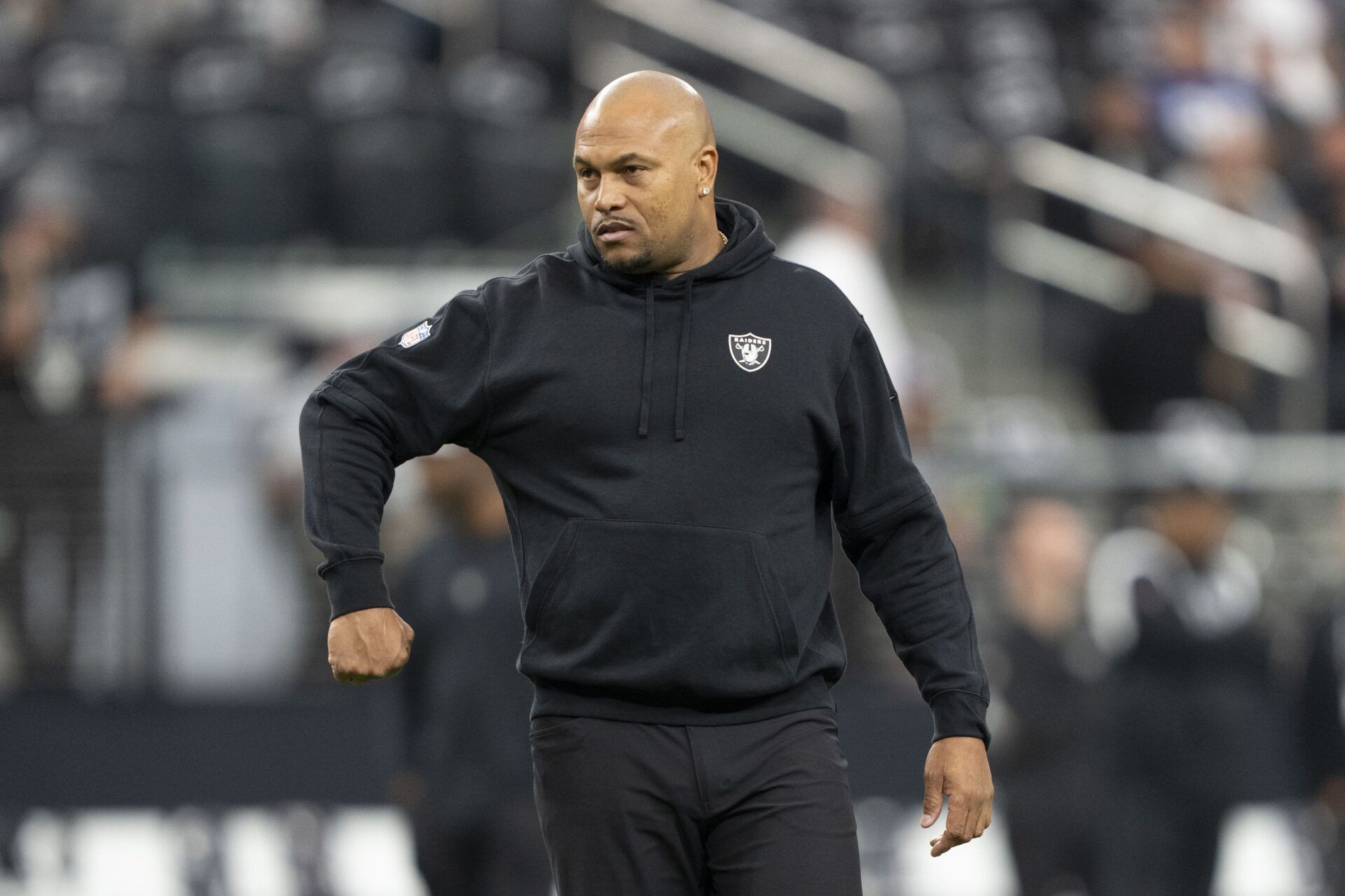 Las Vegas Raiders interim head coach gives a signal prior to the game against the New York Giants.